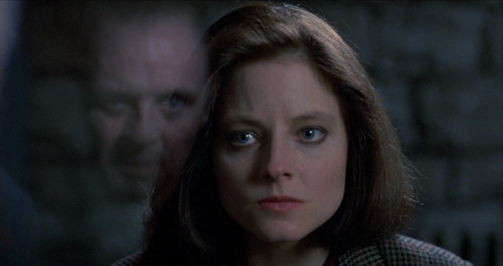 Clarice y Hannibal reflejado en el cristal en The Silence of the Lambs